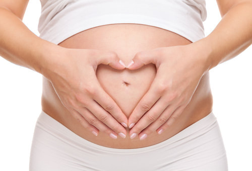 Woman loves her pregnancy stomach